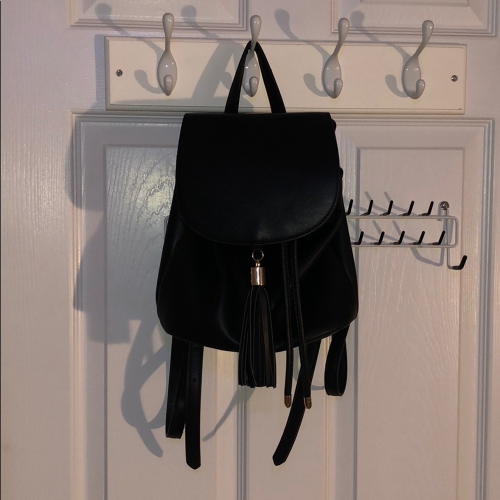 Mini black leather bookbag
